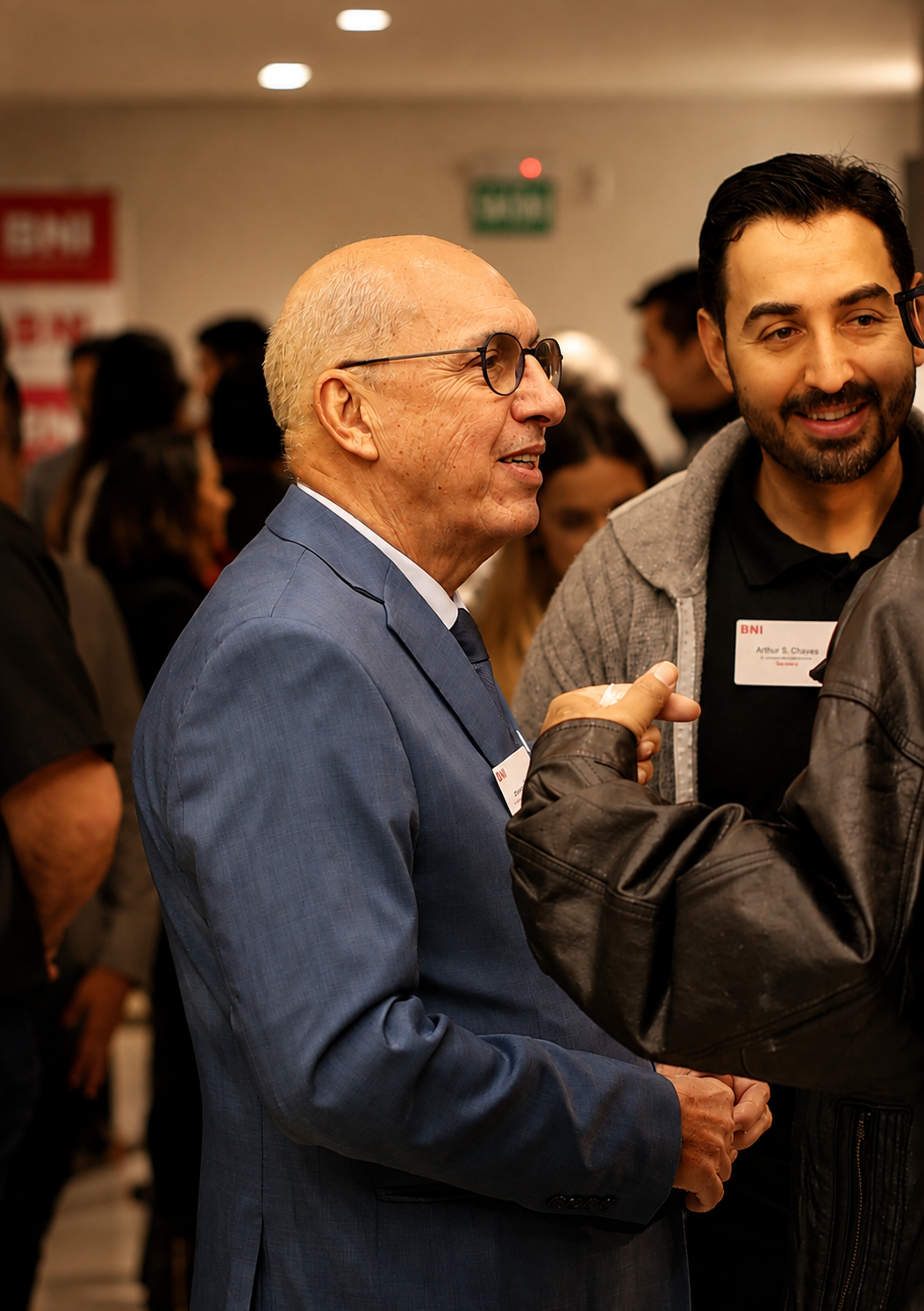 Dr. Arnoni Caldart em momento de networking com participantes